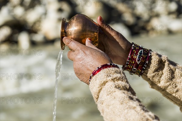 A female pilgrim praying