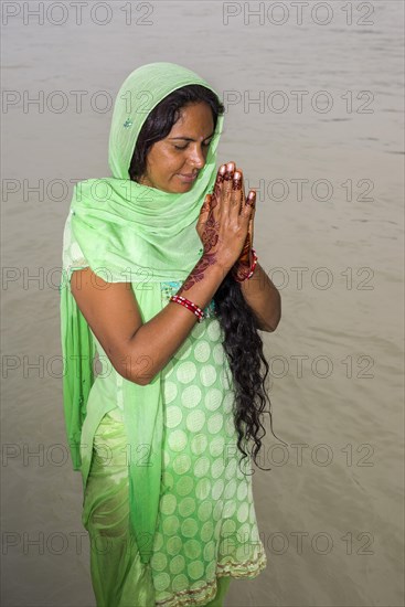 A young woman with long black hair