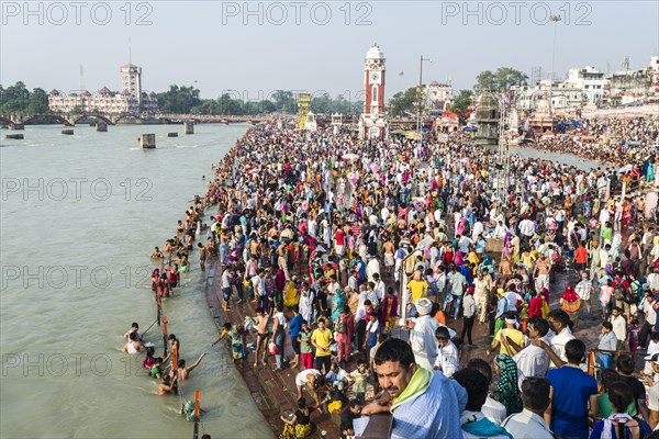 Masses of pilgrims are gathering for bathing at Harki Pauri Ghat at the holy river Ganges