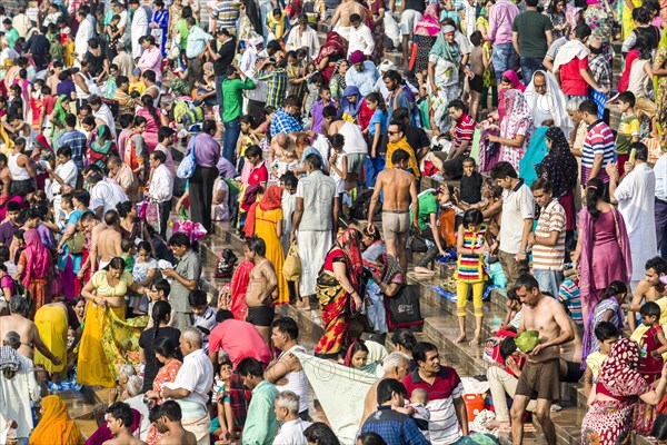 Masses of pilgrims are gathering for bathing at Harki Pauri Ghat at the holy river Ganges
