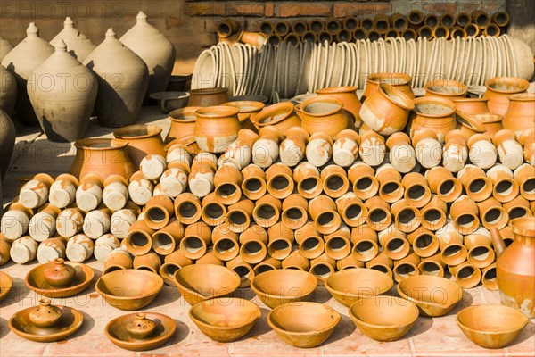 Pottery is drying in the sun in the streets