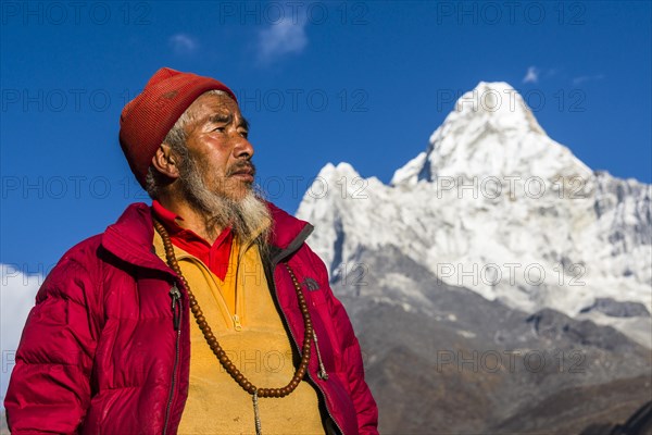 Portrait of a buddhist monk looking into the sky