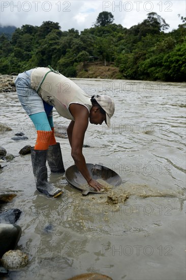 Woman washing gold