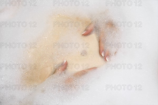 Woman in bubble bath