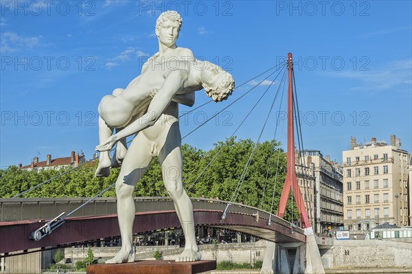 The Weight of Oneself statue on the banks of the Saone River near the Palais de Justice footbridge, Lyon