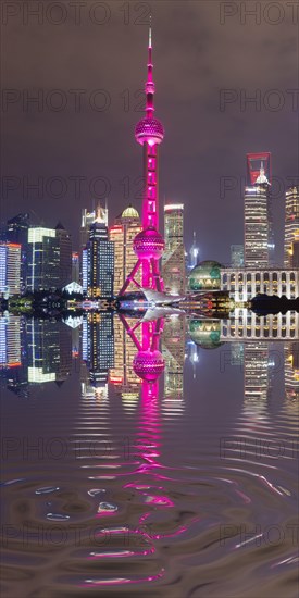 Pudong financial district with Oriental Pearl Tower at night