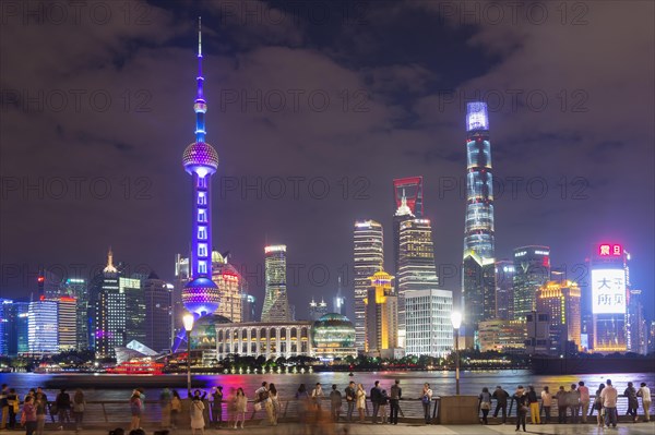 Pudong financial district with Oriental Pearl Tower at night