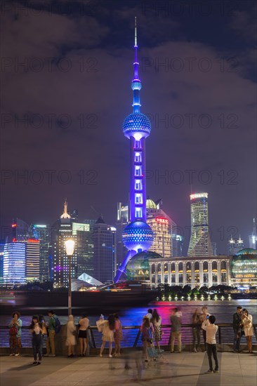 Pudong financial district with Oriental Pearl Tower at night