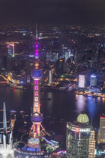 View over Pudong with Oriental Pearl Tower at night