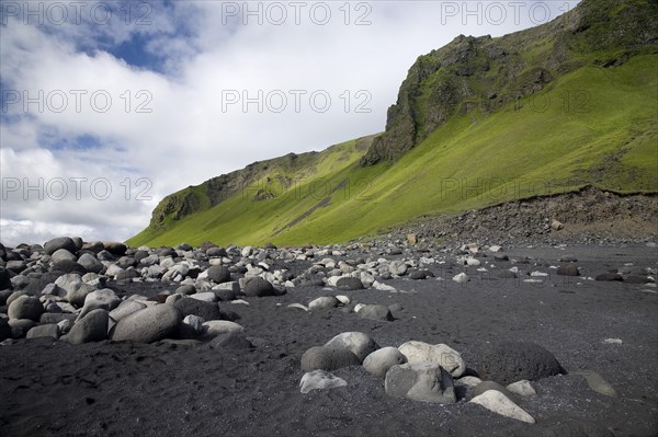 Lava beach with sand and stones