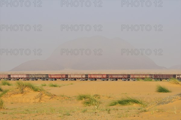 Railway through the desert for the transport of iron ore from M'Haoudat to Nouadhibou port