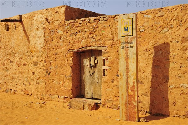 Old wooden door of an Islamic library in the historic centre