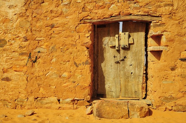 Old wooden door of an Islamic library in the historic centre