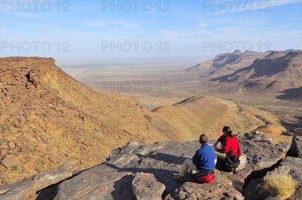 Tourists admiring mountain scenery at Amogjar pass
