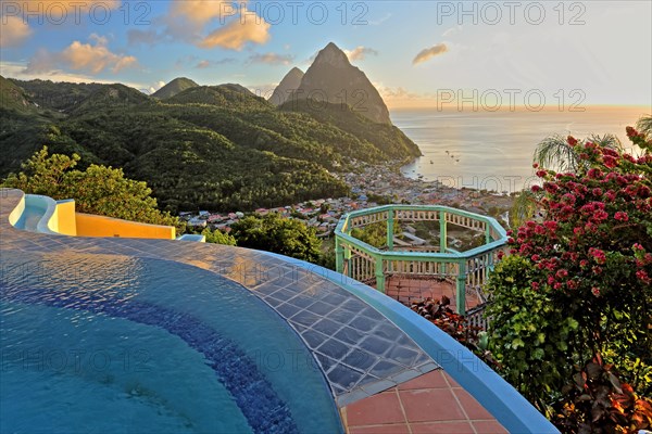 Swimming pool of the La Haut Resort with view of the village and the two Pitons
