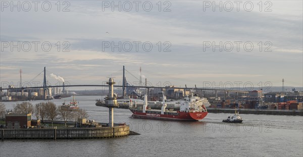 Container ship going under the Kohlbrand bridge