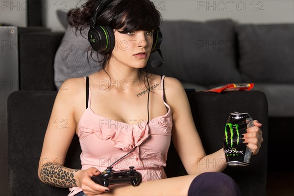 Young woman gaming in the living room