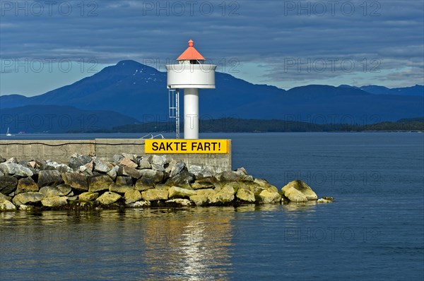 Molde lighthouse with sail slowly warning sign