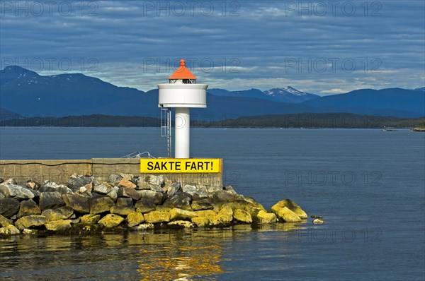 Molde lighthouse with sail slowly warning sign