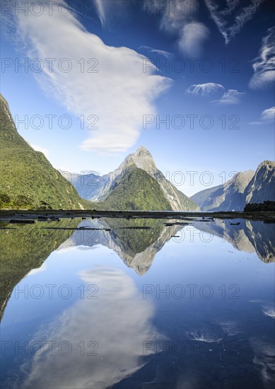 Mitre Peak with blue sky and clouds