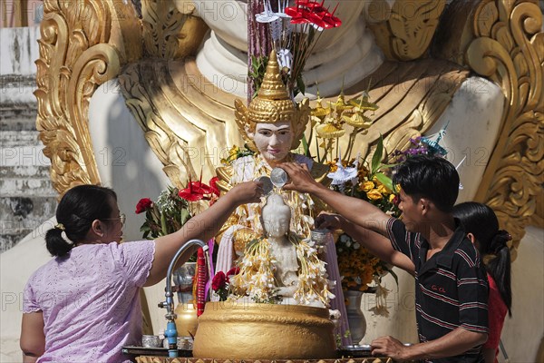 Local visitors paying homage to Buddha