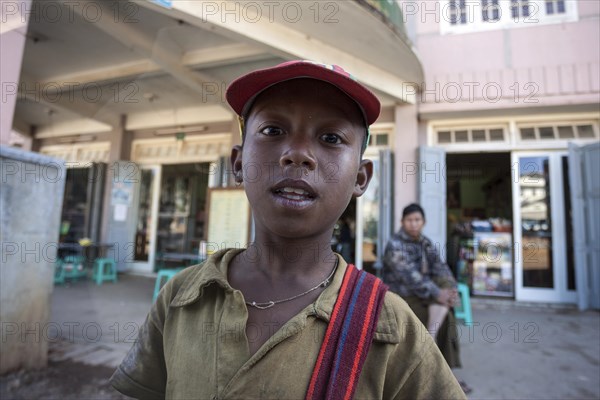 Local boy with cap