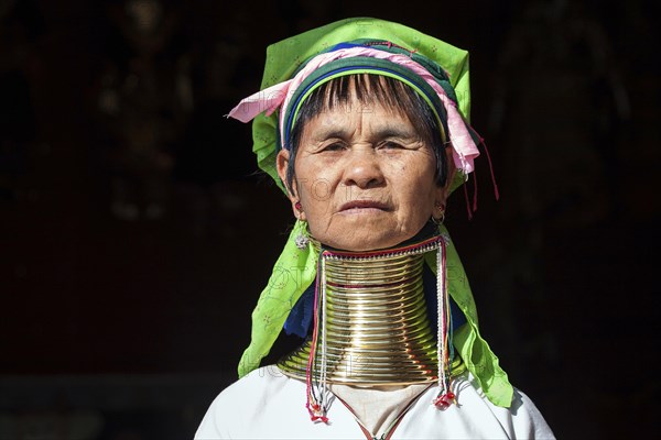 Woman from the tribe of the Padaung in typical dress and headgear