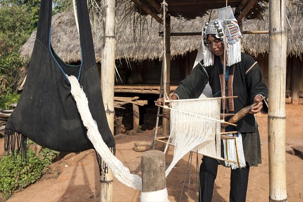 Local woman in typical clothes and with typical headgear