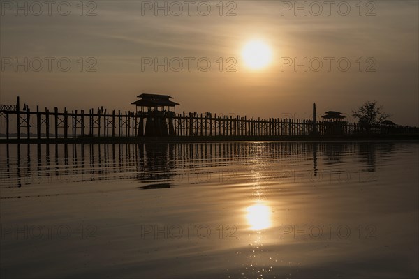 People walking on the U Bein Bridge