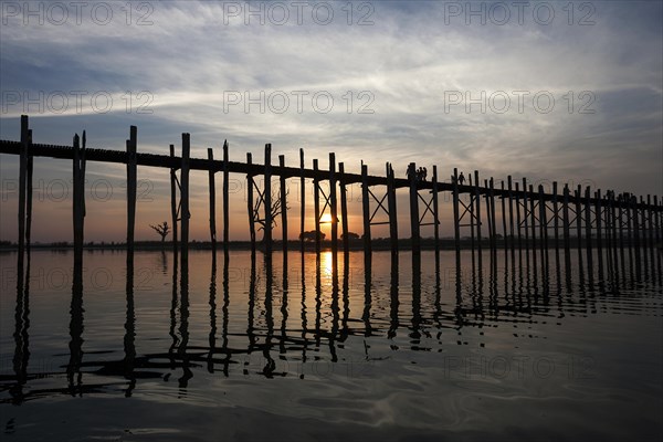 People walking on the U Bein Bridge