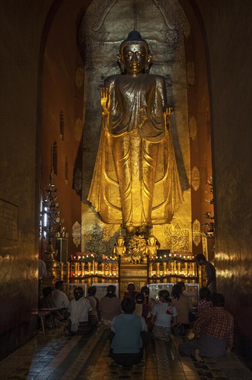 Standing gilded Buddha