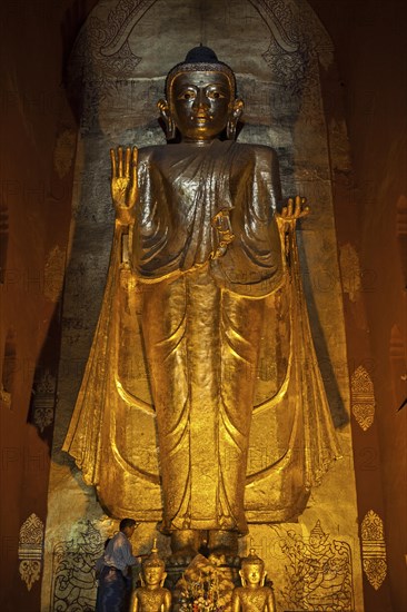 Standing gilded Buddha