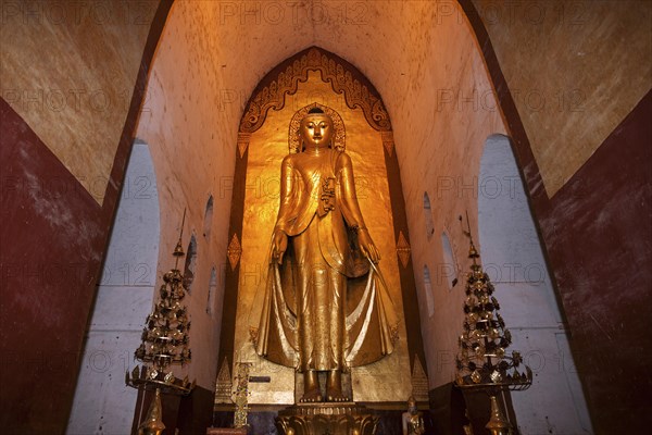 Standing gilded Buddha