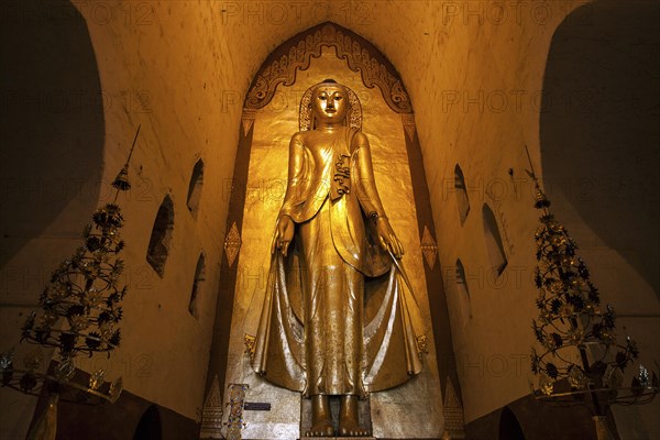 Standing gilded Buddha
