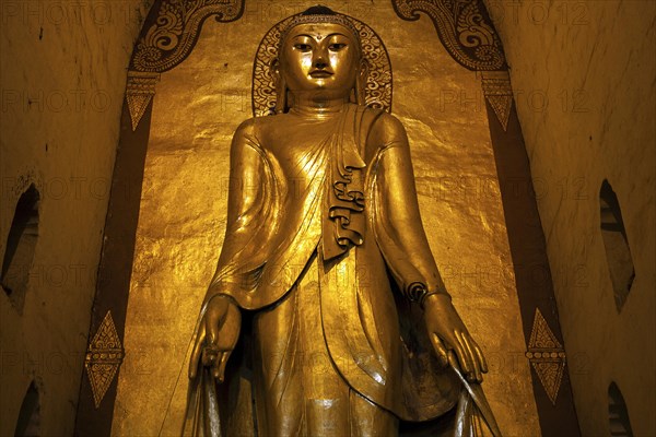 Standing gilded Buddha