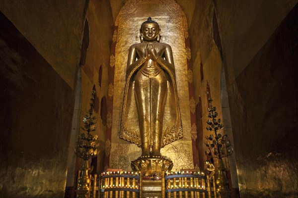 Standing gilded Buddha