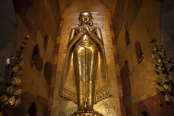 Standing gilded Buddha