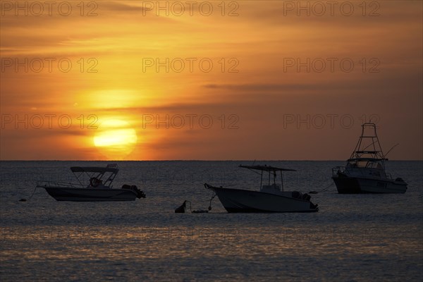 Sunset over the sea in the Beau Vallon Bay