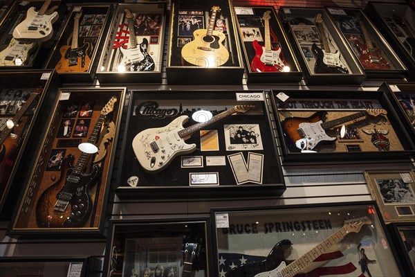 Guitars with autographs of various famous musicians