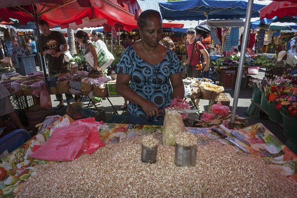 Local woman selling grated breadfruit