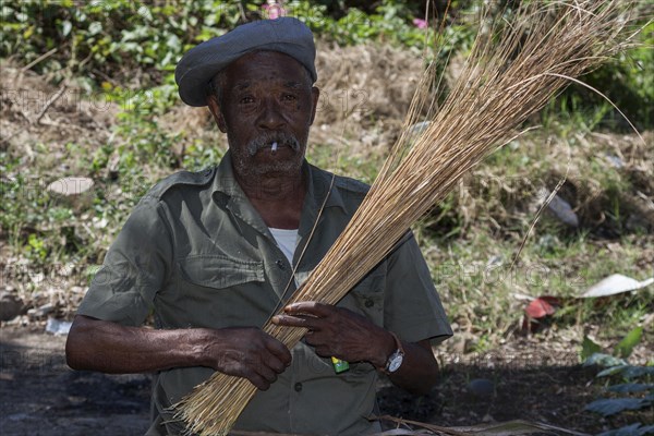 Local man with a cigarette and hat