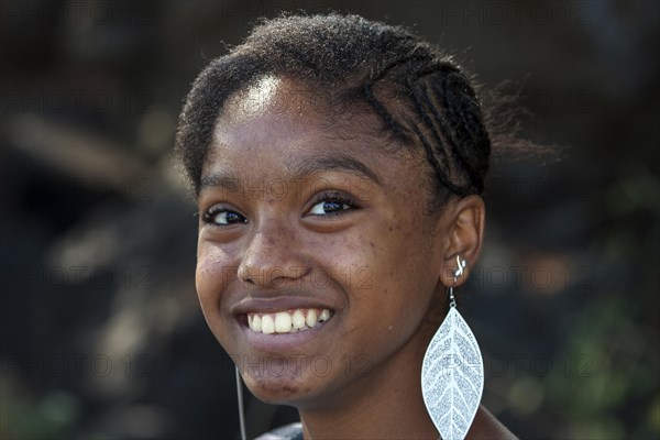 Local girl with silver earrings