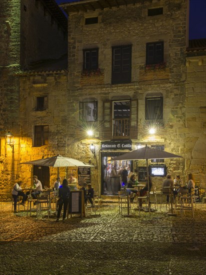 Restaurant on the main square in the evening
