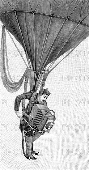 A Japanese war photographer hanging on a gas balloon