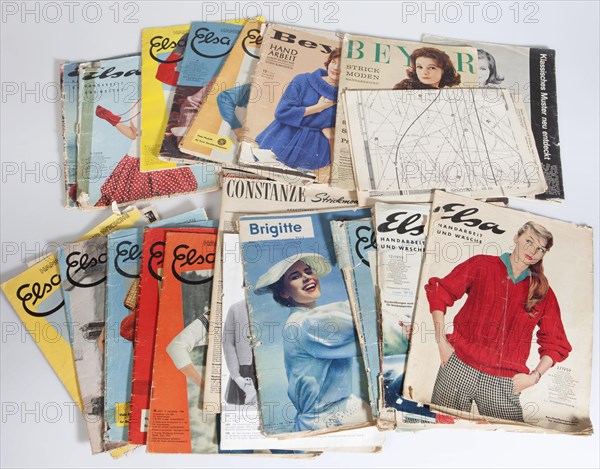 Front pages of old fashion magazines from the 1950s