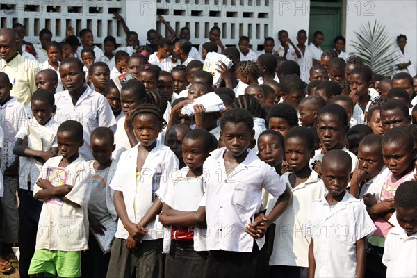 Students in schoolyard during morning assembly