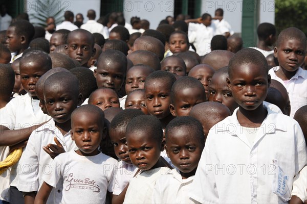 Group of students in schoolyard during morning assembly