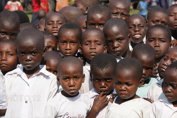 Group of students in schoolyard during morning assembly