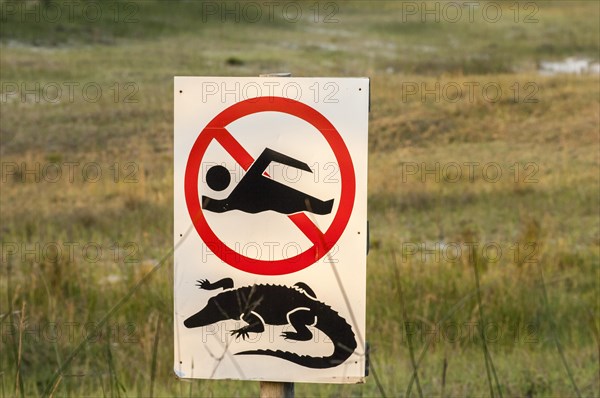 Sign swimming forbidden because of crocodiles