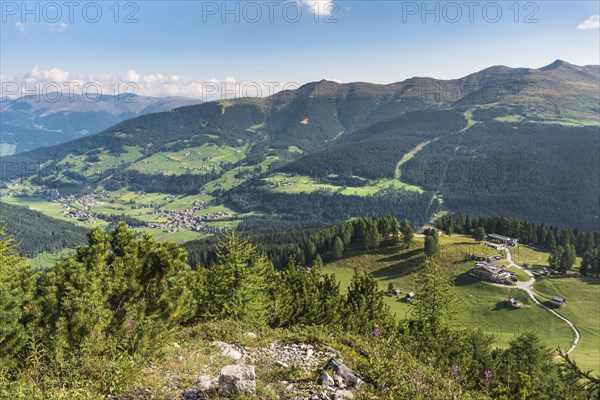 View from the Croda Rossa heads to the Rotwandalm with mountain station of the cable car